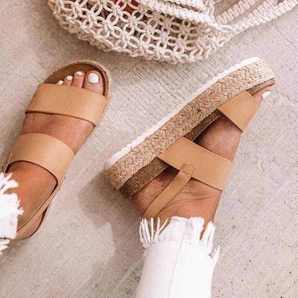Platform sandals. Never worn.